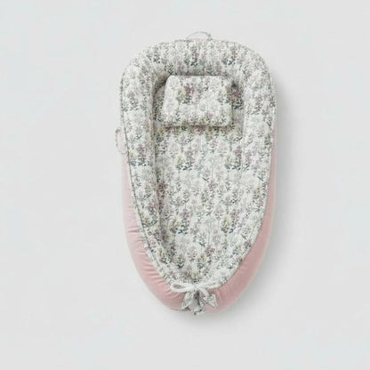 Réducteur de lit bébé Floralys en tissu hypoallergénique et respirant