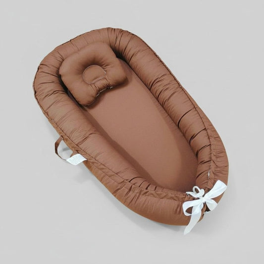 Réducteurs de lit adaptés dès la naissance en jolie couleur caramel