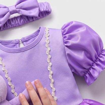 Détail du corsage et des manches bouffantes de la robe mauve bébé