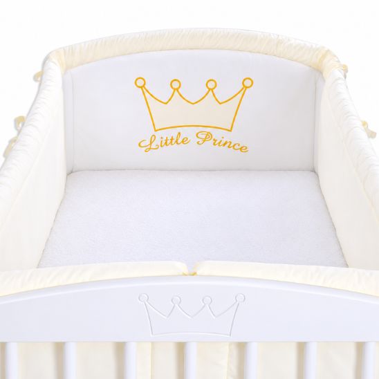 Tour de lit bébé Petit Prince ivoire installé dans un lit à barreaux blanc