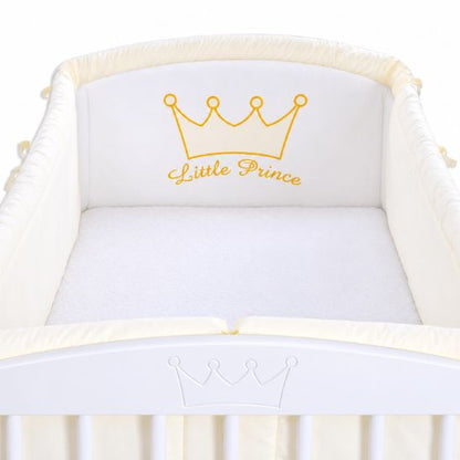 Tour de lit bébé Petit Prince ivoire installé dans un lit à barreaux blanc