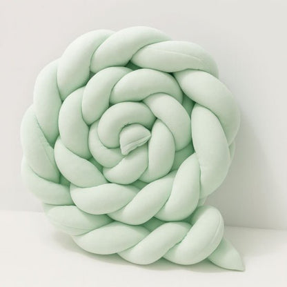 Tresse de lit bébé tressée vert d’eau 3 brins, protection douce et sécurisante pour berceau.