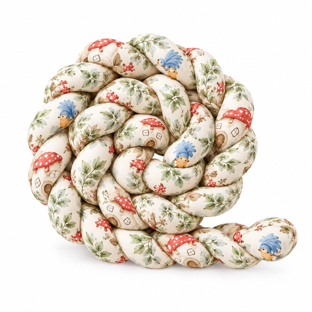 Tresse de lit enfant motif champignons et oiseaux enroulée sur fond blanc