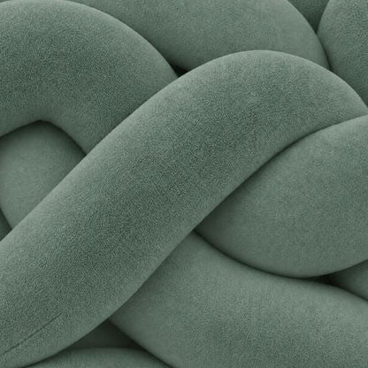 Tresse de lit vert de gris, gros plan sur un nœud du tressage en velours