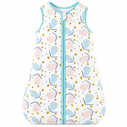 Turbulette bébé TOG 1.5 à motif pétales pastel rose et bleu, biais turquoise